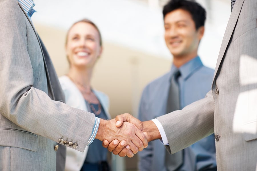 two men shaking hands